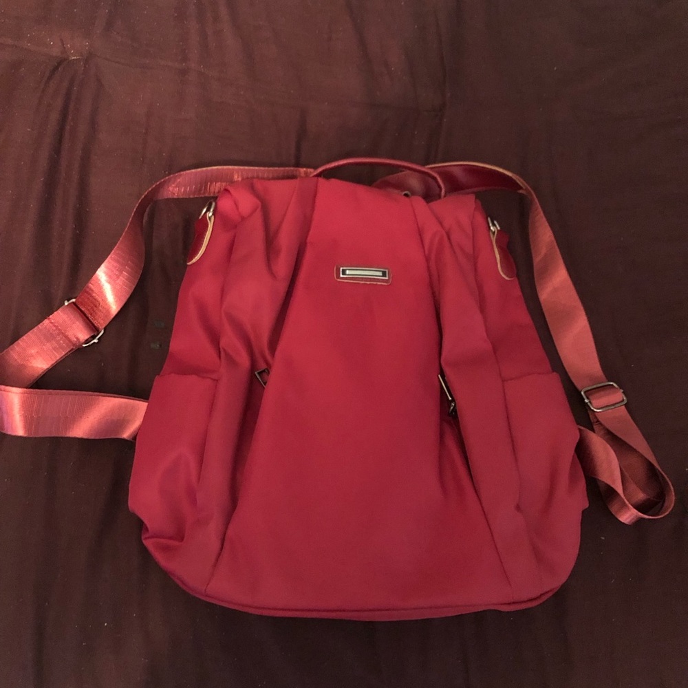 Red, security proof back purse.